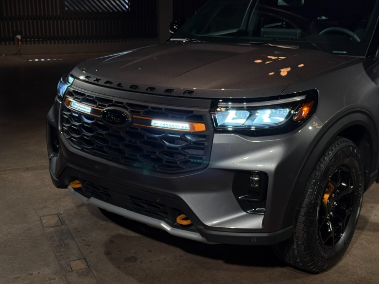 Front end of a 2025 Ford Explorer Tremor with the lights on