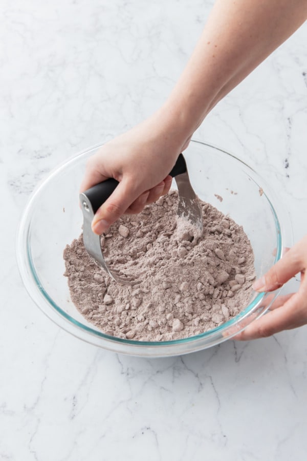 After incorporating butter with a pastry blender, the pieces of butter will be pea sized.